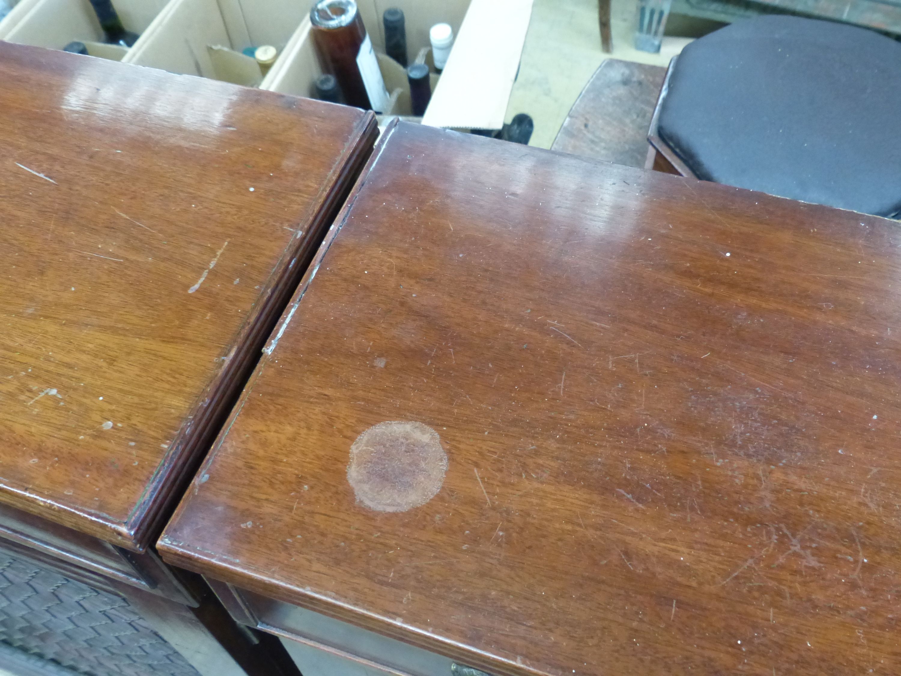 A pair of Regency style mahogany side cabinets, width 131cm, depth 28cm, height 104cm